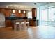 Open concept kitchen with island and hardwood floors at 505 E 6Th St # 301, Charlotte, NC 28202