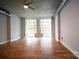 Living room with hardwood floors and large windows at 505 E 6Th St # 301, Charlotte, NC 28202