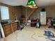 Unfinished basement featuring wooden paneling, stairs, and ample space for storage or renovation at 515 37Th Sw St, Hickory, NC 28602