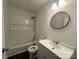 This bathroom features a shower-tub combination with neutral walls and a white vanity at 515 37Th Sw St, Hickory, NC 28602