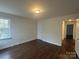 This bedroom features a window, closet, and entry to the next room at 515 37Th Sw St, Hickory, NC 28602