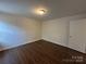 This bedroom features wood-look floors, neutral walls, and ample natural light at 515 37Th Sw St, Hickory, NC 28602