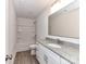 Freshly updated bathroom with granite countertop, white cabinets, and a shower-tub combo at 5613 Morgan Mill Rd, Monroe, NC 28110