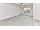 Spacious bedroom with a ceiling fan and a large window offering views of the outdoors at 5613 Morgan Mill Rd, Monroe, NC 28110