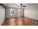 Well-lit bedroom with hardwood floors and ceiling fan at 101 Wynnchester Rd, Gastonia, NC 28056