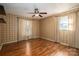 Bedroom with hardwood floors and plaid wallpaper at 101 Wynnchester Rd, Gastonia, NC 28056