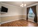 Charming dining room with hardwood floors and a window view at 101 Wynnchester Rd, Gastonia, NC 28056