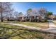 Side view of brick ranch house, well-maintained lawn at 101 Wynnchester Rd, Gastonia, NC 28056