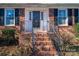 Brick front porch with steps leading to the entrance at 101 Wynnchester Rd, Gastonia, NC 28056