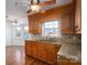 Kitchen boasts wood cabinets, granite countertops, and a breakfast nook at 101 Wynnchester Rd, Gastonia, NC 28056