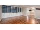 Living room with built-in shelving and hardwood floors at 101 Wynnchester Rd, Gastonia, NC 28056