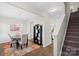 Bright dining area with hardwood floors and a stylish chandelier at 117 Fairfield Dr, Troutman, NC 28166