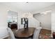 Elegant dining room with chandelier and an oval wooden table at 117 Fairfield Dr, Troutman, NC 28166