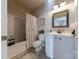 Clean bathroom with white vanity, bathtub, and neutral decor at 12117 Frogs Leap Ct, Charlotte, NC 28277