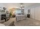 Spacious bedroom with double doors and ensuite bathroom at 12117 Frogs Leap Ct, Charlotte, NC 28277