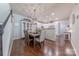 Charming dining area with a wooden table and kitchen access at 12117 Frogs Leap Ct, Charlotte, NC 28277