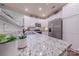 Modern kitchen with white cabinets and stainless steel appliances at 12117 Frogs Leap Ct, Charlotte, NC 28277