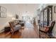 Living room with hardwood floors and access to a sunroom at 12117 Frogs Leap Ct, Charlotte, NC 28277