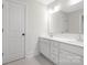 Elegant bathroom with double vanity, stylish mirrors, and modern fixtures at 13019 Arnold Palmer Cir # 832, Lancaster, SC 29720