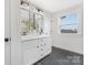 Elegant bathroom featuring dual sinks, stylish mirrors, modern fixtures, and sleek cabinetry for a luxurious feel at 13019 Arnold Palmer Cir # 832, Lancaster, SC 29720