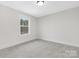 Bright bedroom with a window at 13019 Arnold Palmer Cir # 832, Lancaster, SC 29720