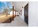 Welcoming front porch featuring stylish wood columns and a modern front door at 1306 Eddie St, Gastonia, NC 28054