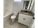 Clean bathroom with updated vanity and patterned tile floor at 1308 Walter Taylor Way # Eqx0105, Charlotte, NC 28206