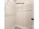 Walk-in closet with white shelving at 1308 Walter Taylor Way # Eqx0105, Charlotte, NC 28206