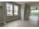 Open-concept room with light-colored flooring, abundant natural light, and neutral paint at 1308 Walter Taylor Way # Eqx0105, Charlotte, NC 28206