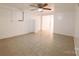 Finished basement with tile flooring and ceiling fan at 152 Woodlynn Dr, Charlotte, NC 28214