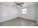 Bright bedroom with tile floors and one window at 152 Woodlynn Dr, Charlotte, NC 28214