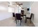 Dining area with a granite table and four black chairs at 152 Woodlynn Dr, Charlotte, NC 28214