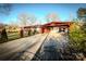 House exterior showcasing carport and landscaping at 152 Woodlynn Dr, Charlotte, NC 28214