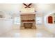 Bright living room featuring a fireplace and marble tile floors at 152 Woodlynn Dr, Charlotte, NC 28214