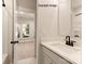 Modern bathroom with vanity and shower/tub combo at 1607 Polk St # Eqx0210, Charlotte, NC 28206