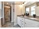 Modern bathroom with double vanity and large shower at 1607 Polk St # Eqx0210, Charlotte, NC 28206