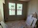 Unfinished bedroom with new windows at 1607 Polk St # Eqx0210, Charlotte, NC 28206