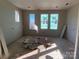 Unfinished bedroom with drywall and windows at 1607 Polk St # Eqx0210, Charlotte, NC 28206