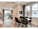 Modern dining room with wooden table and black chairs at 1607 Polk St # Eqx0210, Charlotte, NC 28206