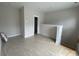 Bonus room or upstairs landing with neutral walls, ready for your customizations at 1611 Polk St # Eqx0209, Charlotte, NC 28206