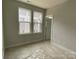 Bedroom featuring natural light from two windows at 1615 Polk St # Eqx0208, Charlotte, NC 28206