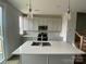 Modern kitchen featuring large island, stylish pendant lights and stainless steel appliances at 1615 Polk St # Eqx0208, Charlotte, NC 28206