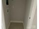 A neutral colored laundry room with connections for washer and dryer at 1615 Polk St # Eqx0208, Charlotte, NC 28206