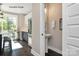 A half bath adjacent to an eat in kitchen with modern finishes at 1615 Polk St # Eqx0208, Charlotte, NC 28206