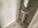 Bathroom featuring decorative tile floors and a pedestal sink at 1615 Polk St # Eqx0208, Charlotte, NC 28206