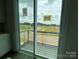 View from sliding glass doors on a new home showcasing the neighborhood at 1615 Polk St # Eqx0208, Charlotte, NC 28206