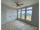 Bedroom with large windows offering natural light and a view of neighborhood at 1619 Polk St # Eqx0207, Charlotte, NC 28206