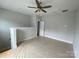 Bonus room includes a ceiling fan and access to the attic at 1619 Polk St # Eqx0207, Charlotte, NC 28206