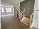 View of the new staircase, with hardwood steps and modern iron railings at 1619 Polk St # Eqx0207, Charlotte, NC 28206