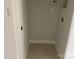 A storage room includes tile flooring, outlet and light fixture at 1619 Polk St # Eqx0207, Charlotte, NC 28206